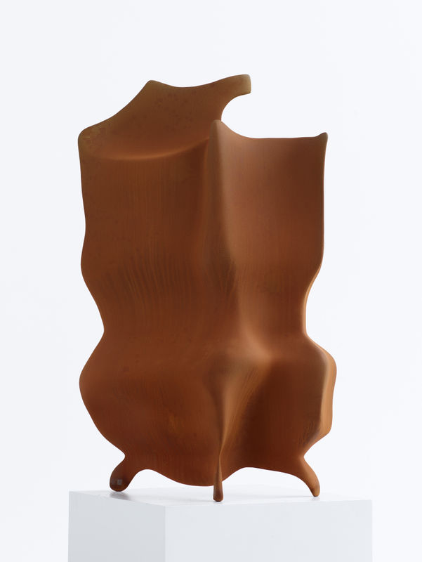 Tony Cragg Corten Steel sculpture on white pedastal