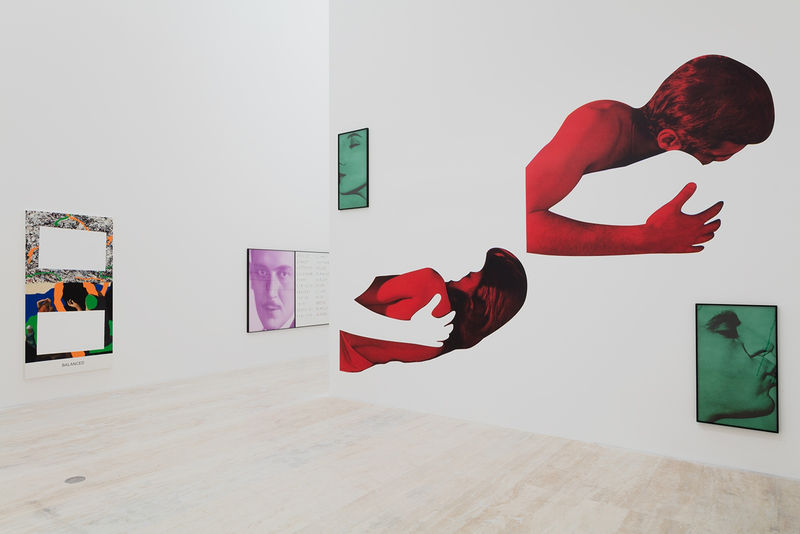Gallery installation, photographic figurative colored collage spans the wall.