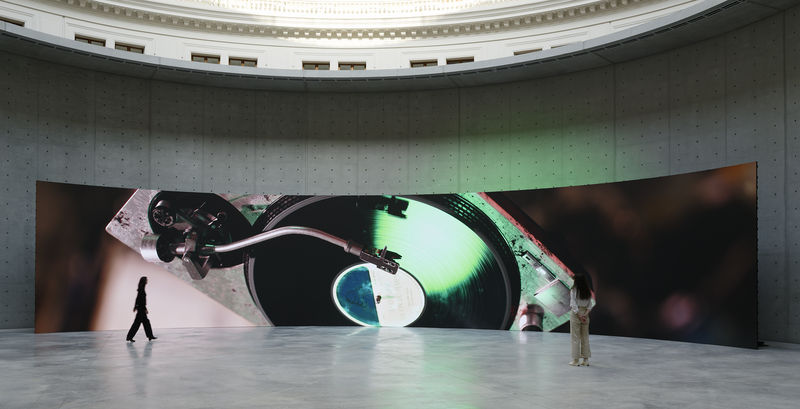 Anri Sala's "Time No Longer" (2021) shows a turntable spinning on itself