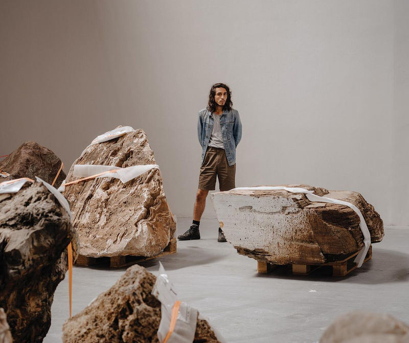 An image containing artist Adrián Villar Rojas at MOCA’s Geffen Contemporary branch