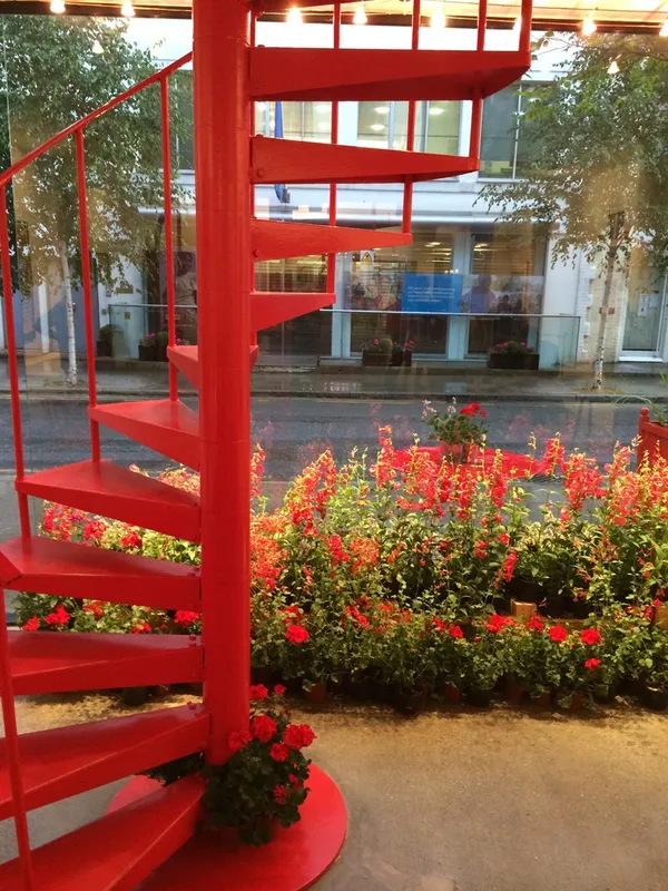 Red flowers in the Rebecca Hossack Art Gallery