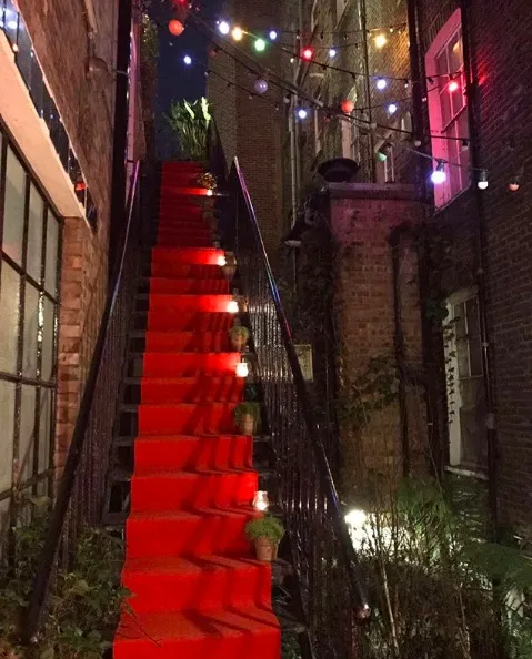 Red carpet at Rebecca Hossack Art Gallery