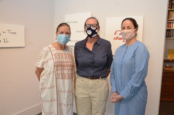 Trinity professor Norma Elia Cantú, artist Ethel Shipton and gallerist Patricia Ruiz-Healy pose in front of Shipton’s work at Ruiz-Healy Art.