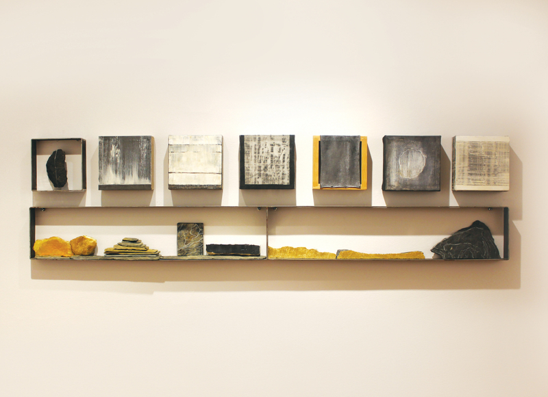 Horizontal Installation, 2018. Stones with gold leaf and yellow resin and oil on canvas, each painting: 8 x 8 in.; 18 x 71 in. overall.