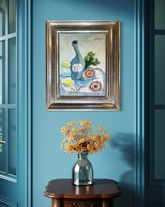 Bottle of wine, urchins, fish and lemon on a table