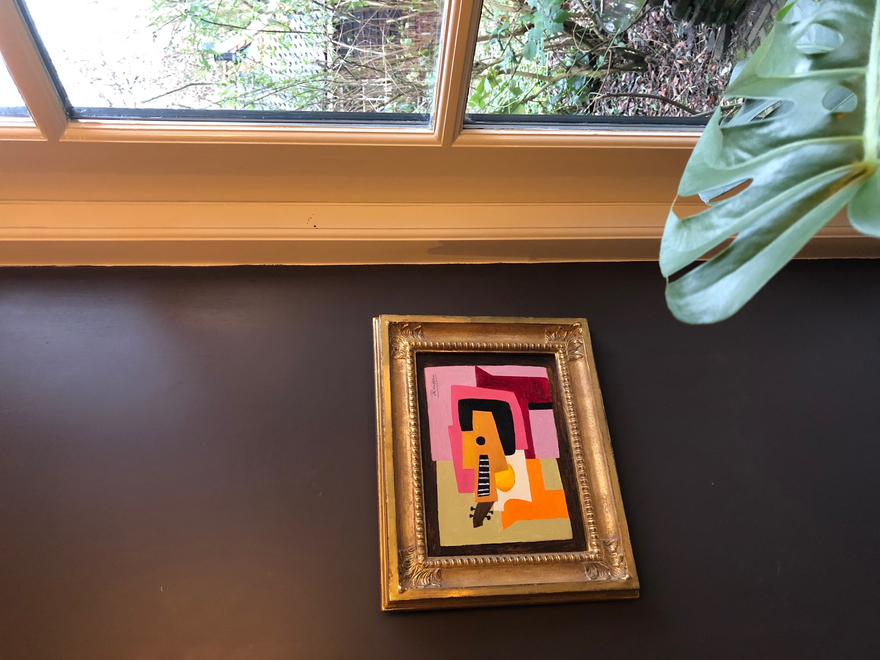 Guitar and bowl on a table