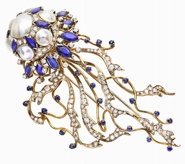 BROOCH, ENRICO SERAFINI, FLORENCE, SIXTIES MATERIAL: yellow, white, diamonds, sapphires and pearls Mabe DESCRIPTION: brooch designed as a jellyfish, with...