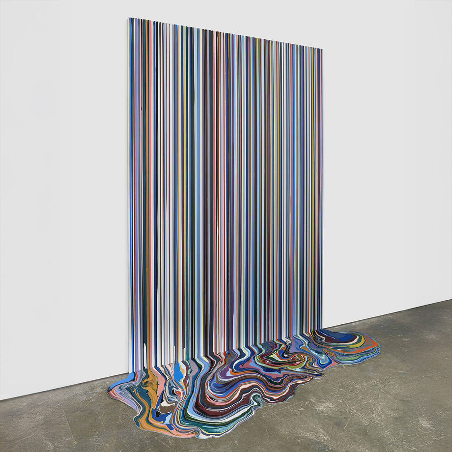 Ian Davenport drip color painting hanging on a wall with paint spilling onto the floor
