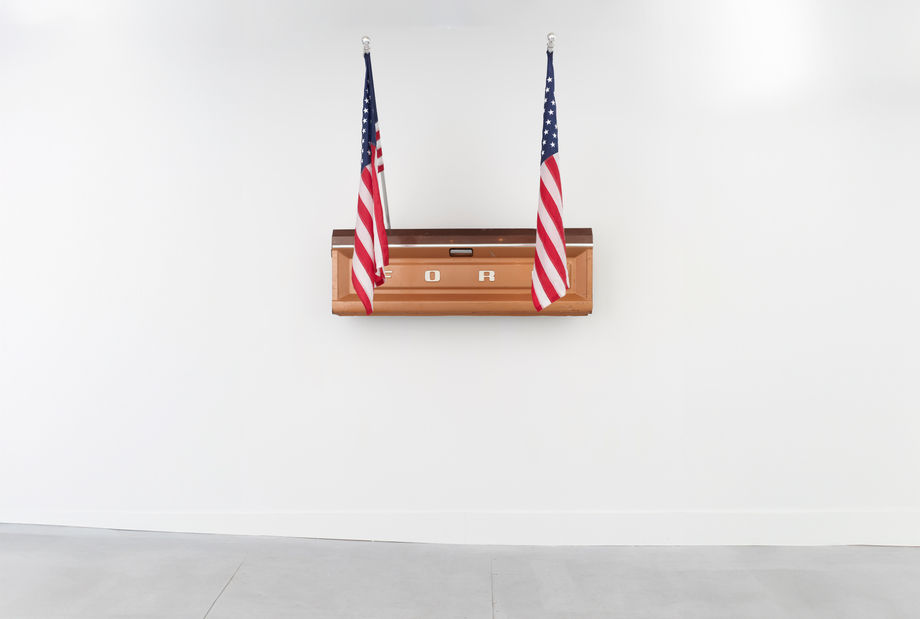 Julian V.L. Gaines, Emmett's Last Ride, 2022. Two American flags, tailgate, enamel, plastic, steel. 67 x 21 x 60 inches (170.2 x 53.3 x 152.4 cm).