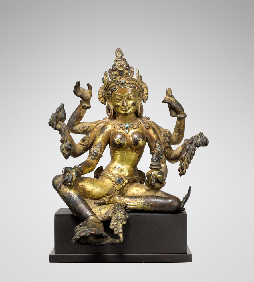 This luminous image of Vasudhara, the Buddhist goddess of wealth, fertility, and spiritual abundance, embodies the refined elegance and devotional intimacy characteristic of medieval Nepalese sculpture.